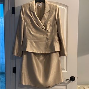 Women’s gold suit